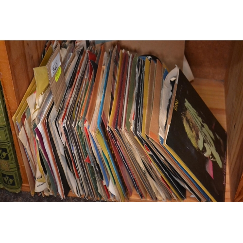 340 - Shelf of vinyl singles including Blondie, Sting, Martha Reeves & the Vandellas etc.