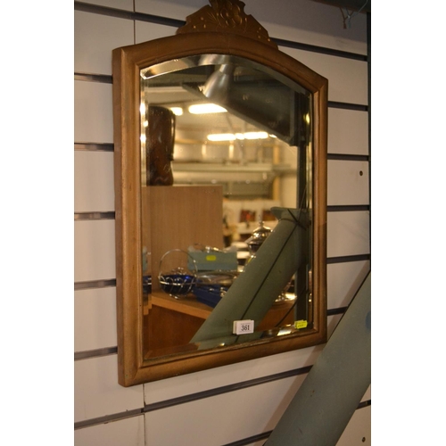 361 - Painted gold framed bevelled mirror with arched top. 62cm x 44cm