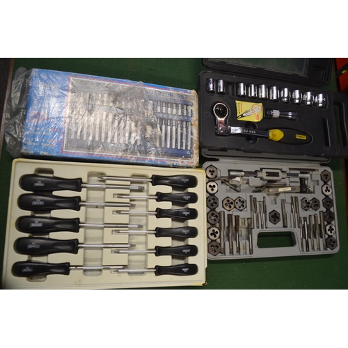 66 - 4 boxed tool sets inc. Torx screwdriver set, 40 bit adapter set, tap & die set + socket set