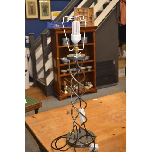 708 - Large modern twisted metal table lamp.