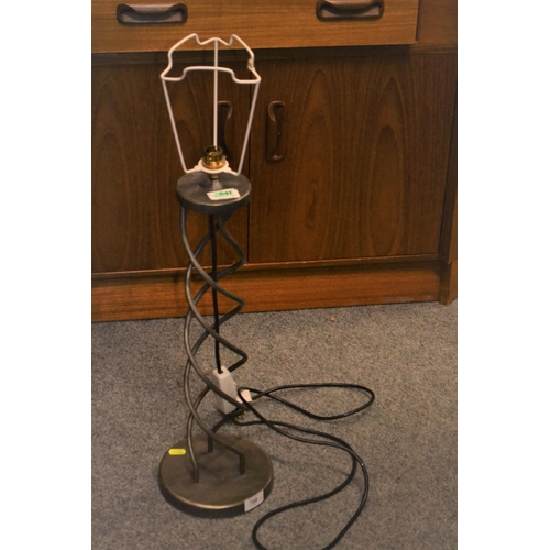 708 - Large modern twisted metal table lamp.