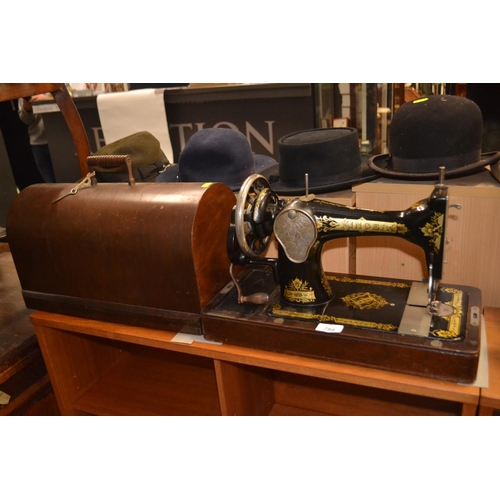 Vintage Singer sewing machine, in case