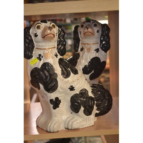 377 - Pair of Staffordshire spaniels 32cm high