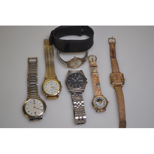441 - Seven various quartz  watches, including Seiko SQ 100 with day/date aperture, Citizen with date... 