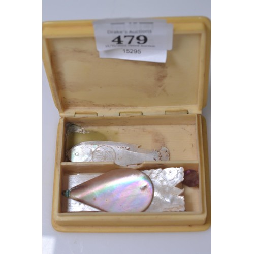 479 - Box containing seven mother-of-pearl gaming tokens and a mother-of-pearl pendant