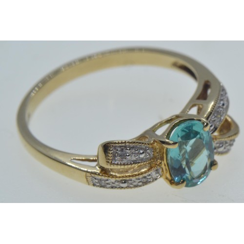 12 - 9ct gold, topaz & diamond 'bow' ring, hallmarked Birmingham, size N1/2, 2.1 grams