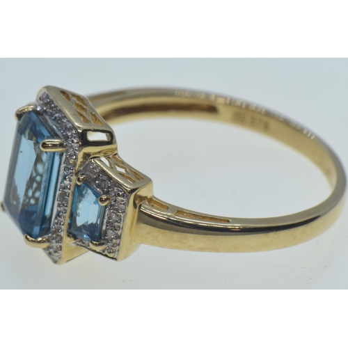 18 - 9ct gold, topaz & diamond cluster ring, hallmarked Birmingham, size W, 3.9 grams