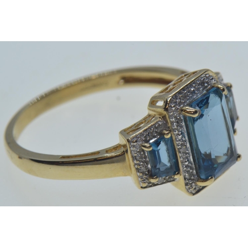 18 - 9ct gold, topaz & diamond cluster ring, hallmarked Birmingham, size W, 3.9 grams