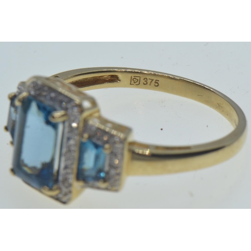 18 - 9ct gold, topaz & diamond cluster ring, hallmarked Birmingham, size W, 3.9 grams