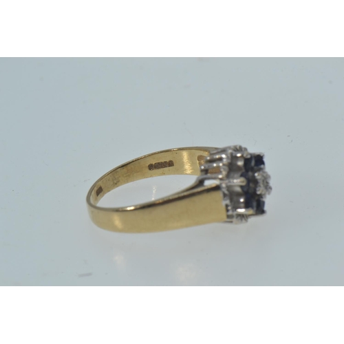 23 - Two 9ct gold rings, including: a sapphire & diamond cluster, size N & a sapphire & white... 