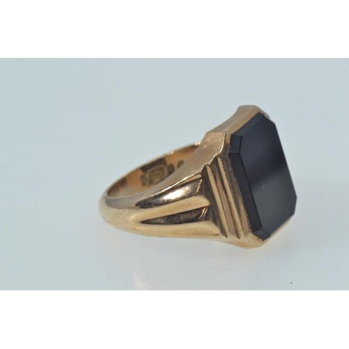 24 - 9ct gold & onyx signet ring, hallmarked London 1966, size P1/2, 8.69 grams