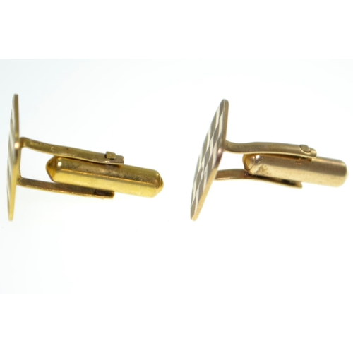 30 - Pair of 9ct gold cufflinks, with engine turned decoration, hallmarked for Fred Manshaw Ltd, London 1... 