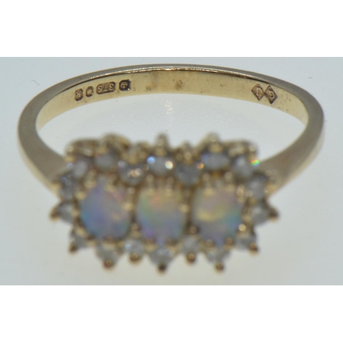 34 - 9ct gold, opal & diamond triple cluster ring, hallmarked London 1982, size I, 1.78 grams