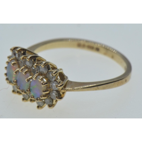 34 - 9ct gold, opal & diamond triple cluster ring, hallmarked London 1982, size I, 1.78 grams