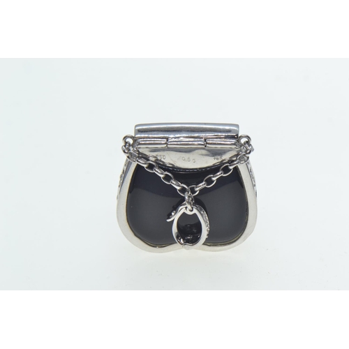 59 - 18ct white gold, diamond & enamel bag-shaped pendant, length including bale 42mm, 13.54 grams