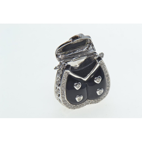 59 - 18ct white gold, diamond & enamel bag-shaped pendant, length including bale 42mm, 13.54 grams