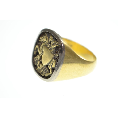 61 - 18ct gold signet ring, set to the top with St. George defeating the dragon, size V, 18.85 grams