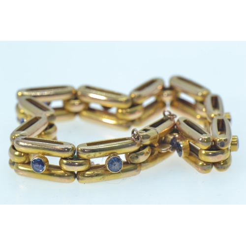 62 - Gold & sapphire bracelet, gold mark rubbed but tests positive for 14ct gold, circumference 180mm... 