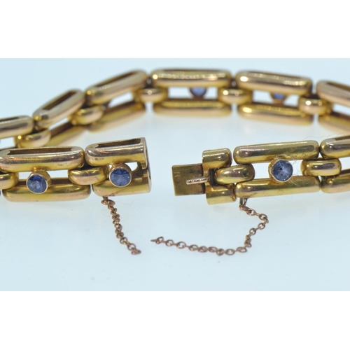 62 - Gold & sapphire bracelet, gold mark rubbed but tests positive for 14ct gold, circumference 180mm... 