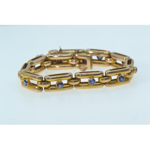 62 - Gold & sapphire bracelet, gold mark rubbed but tests positive for 14ct gold, circumference 180mm... 