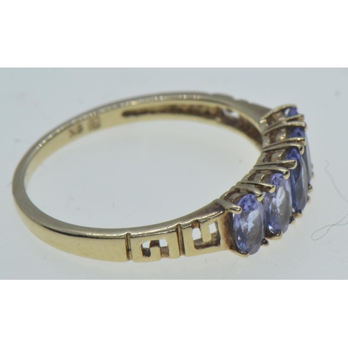 67 - 9ct gold & tanzanite ring, size O1/2, 1.76 grams