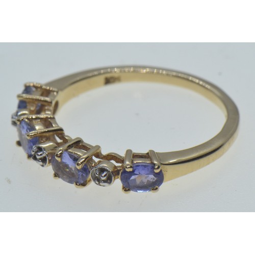 69 - 14ct gold, tanzanite & diamond half hoop ring, size L1/2, 2.16 grams