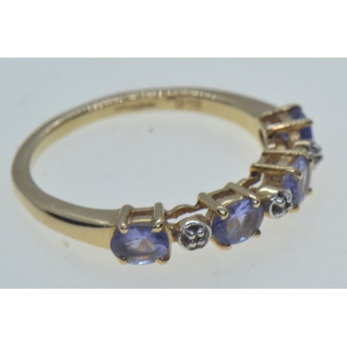 69 - 14ct gold, tanzanite & diamond half hoop ring, size L1/2, 2.16 grams