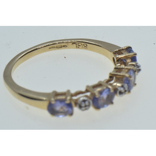 69 - 14ct gold, tanzanite & diamond half hoop ring, size L1/2, 2.16 grams