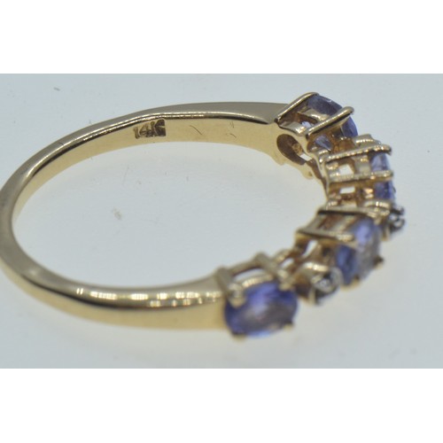 69 - 14ct gold, tanzanite & diamond half hoop ring, size L1/2, 2.16 grams