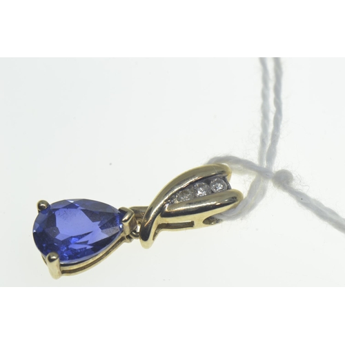 74 - 9ct gold pendant set with a blue teardrop stone & three diamonds, length 20mm, gross weight 1.6 ... 