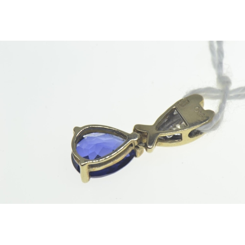 74 - 9ct gold pendant set with a blue teardrop stone & three diamonds, length 20mm, gross weight 1.6 ... 