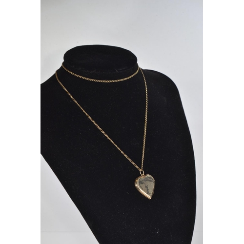 110 - 9ct gold heart-shaped locket, 3.9 grams, & a yellow metal chain, 2.8 grams