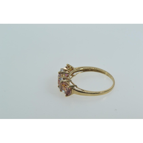 115 - 9ct gold, twilight topaz & diamond ring, size Q, gross weight 1.94 grams