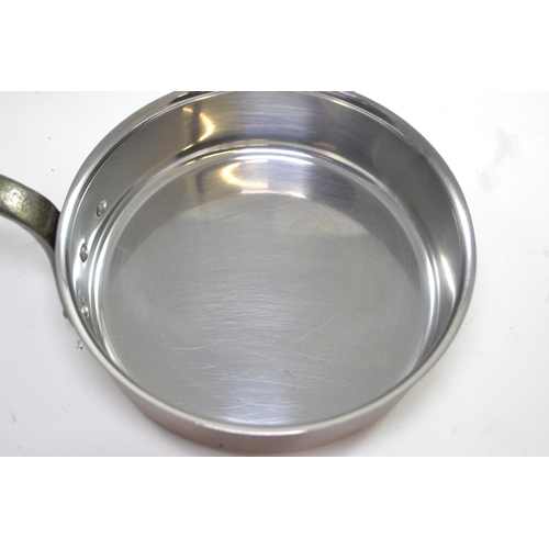 295 - Three Bourgeat stainless steel lined copper pans; two shallow pans and a frying pan, 20, 24 and 28