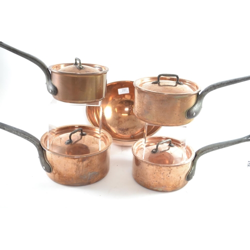 297 - Four Bourgeat stainless steel lined copper lidded saucepans inc. 18, 2x16 and 14, together with a co... 