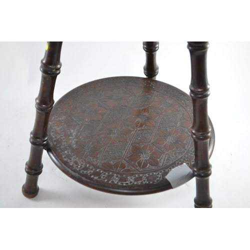 301 - Regency oriental inspired carved two-tier side table with faux bamboo legs, dia 44 x H49cm