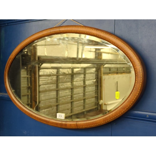 424 - Inlaid bevelled oval mirror, 72 x 42cm