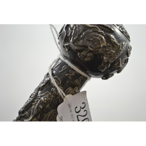 715 - 1925 white metal topped walking cane depicting dragons, fish and crab,  initialed G.E.J., lengt... 