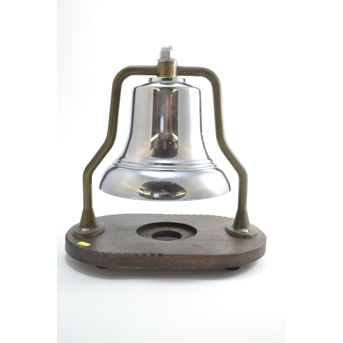 720 - A Mid-C20 Fire Engine Bell, with chrome finish on brass frame, mounted on wooden stand. Bell D25.5cm... 