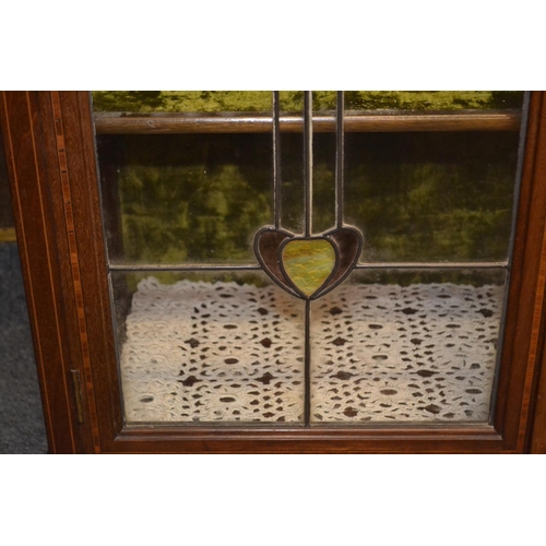 966 - Art Nouveau stained leaded glass fronted display cabinet. (1 panel cracked) 87cm x depth 34cm x heig... 