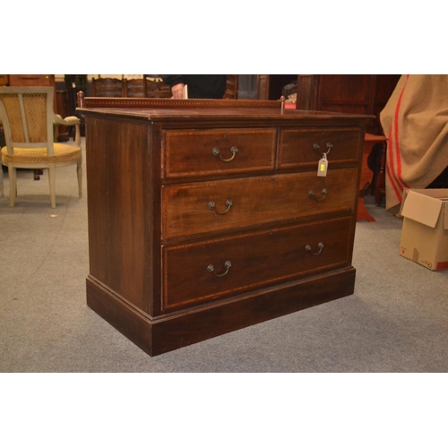 1099 - Edwardian mahogany two over two chest of drawers. 107cm wide x 56cm deep x 85cm high.