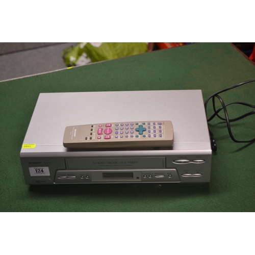 124 - Sharp VHS player with remote