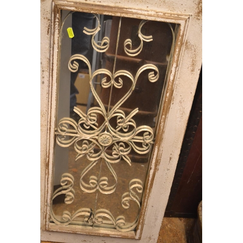 176 - Decorative shutter effect scroll metal mirror. 90cm x 55cm