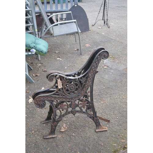 52 - Pair of black metal bench ends