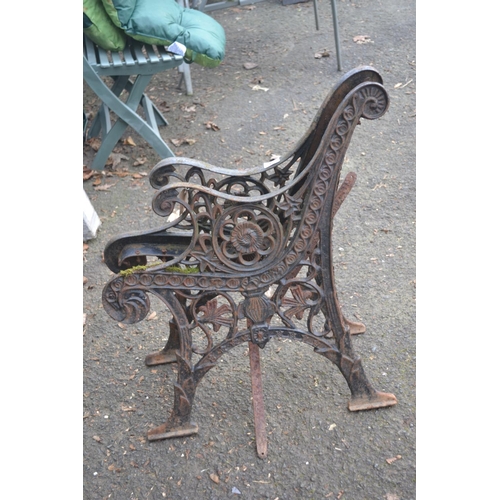 54 - Pair of black metal bench ends