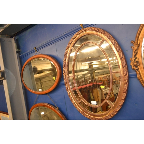 415 - Inlaid bevelled oval mirror, 72 x 42cm, Gilt framed oval mirror with mirrored border, 67.5 x 53cm