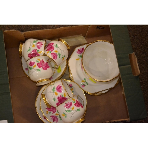 663 - Royal Stafford painted tea cups saucers, plates and sugar bowl. 5 cups with six plates.