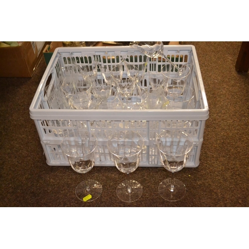 666 - 2 shelves of wine glasses & champagne flutes, all American Fosteria Crystal glasses.