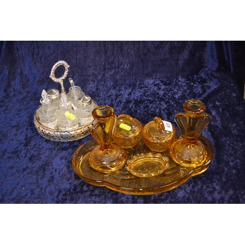 673 - Amber glass dressing table etc plus silver plated cruet set.3.