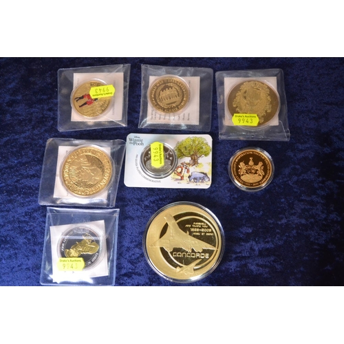 687 - Cased collectable coins and certificates, inc, Concorde and Winnie the Pooh.